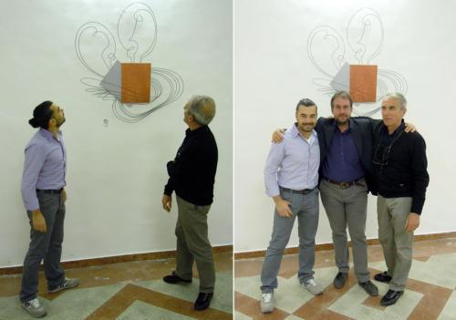 L'Abbraccio in esposizione a Ferrara durante la mostra presso l'Oratorio dell'Annunziata in compagnia dei curatori della mostra.